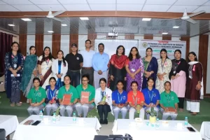 Group photo of dignitaries and faculty at World Breastfeeding Week program